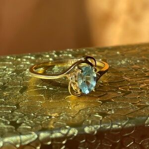 14K Gold Light Blue Topaz and Diamond Accents Ring